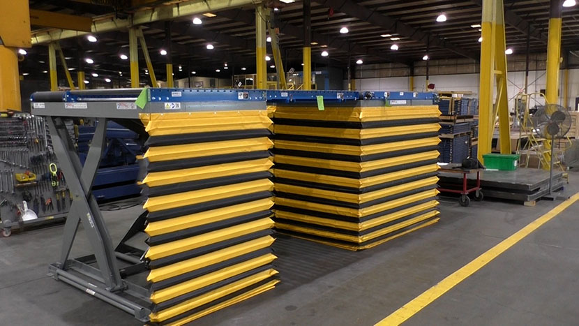Lift & Conveyor System for Cardboard Stacking and Cutting - Autoquip Lifting Solutions