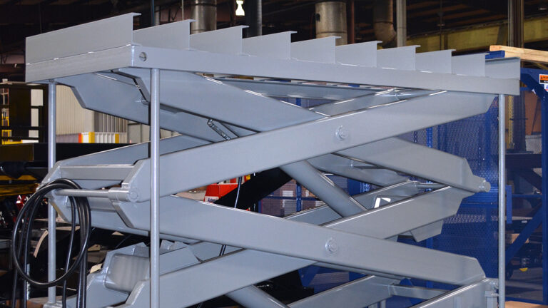 What Are Multi-Stage Scissor Lifts? A Guide to High-Travel Lifting Solutions