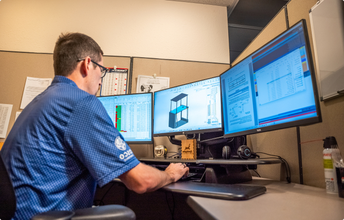 Autoquip employee developing a lift design using CAD software