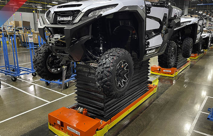 AGV integrated lift system supporting a Kawasaki UTV production line